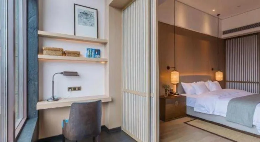 Bed in Jolie Vue Boutique Hotel Sanjiang