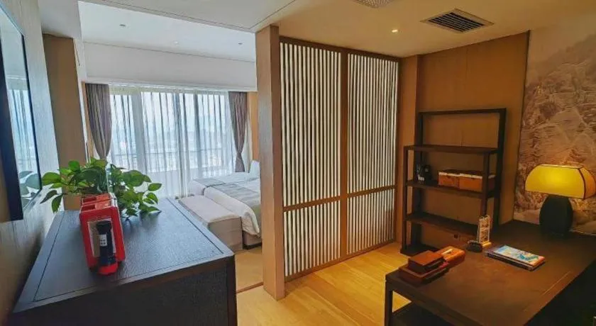 Bed in Jolie Vue Boutique Hotel Sanjiang