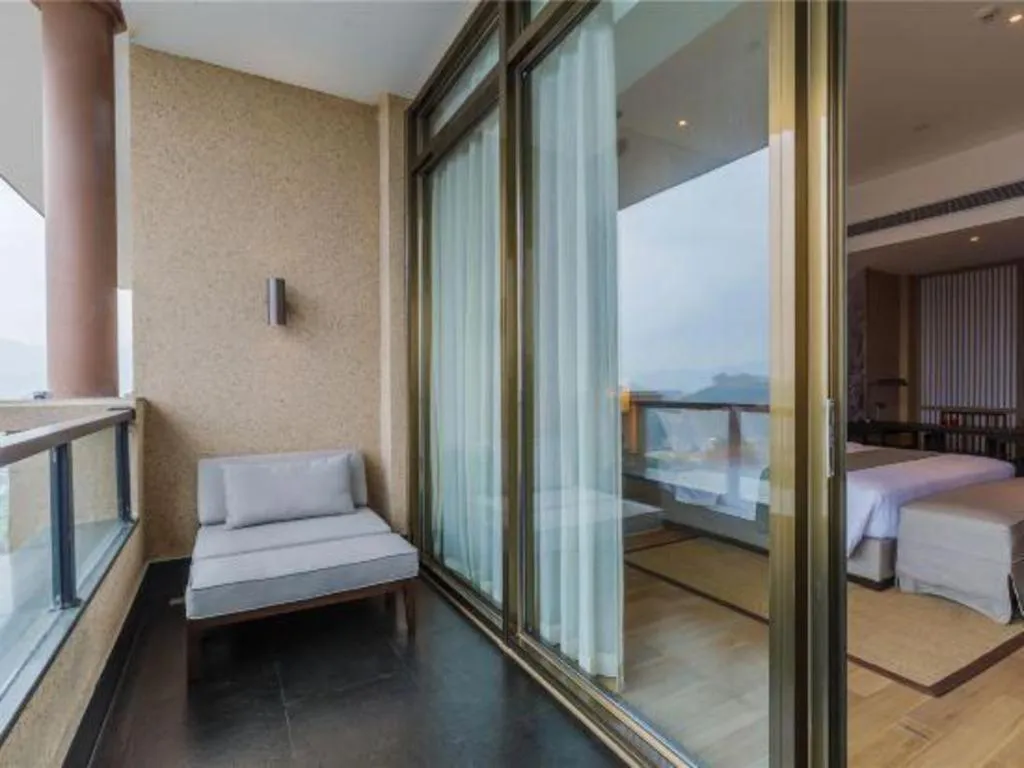 Bed in Jolie Vue Boutique Hotel Sanjiang