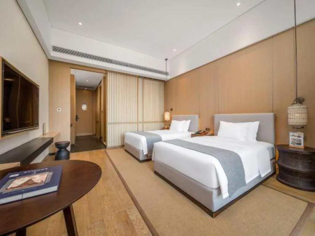 Bed in Jolie Vue Boutique Hotel Sanjiang