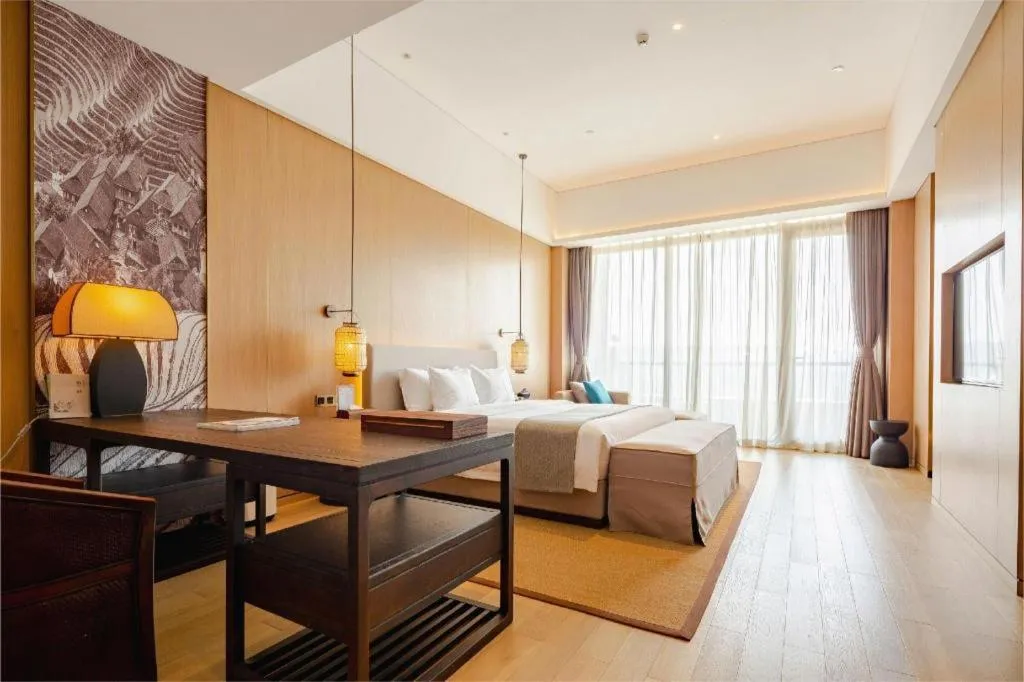 Bed in Jolie Vue Boutique Hotel Sanjiang