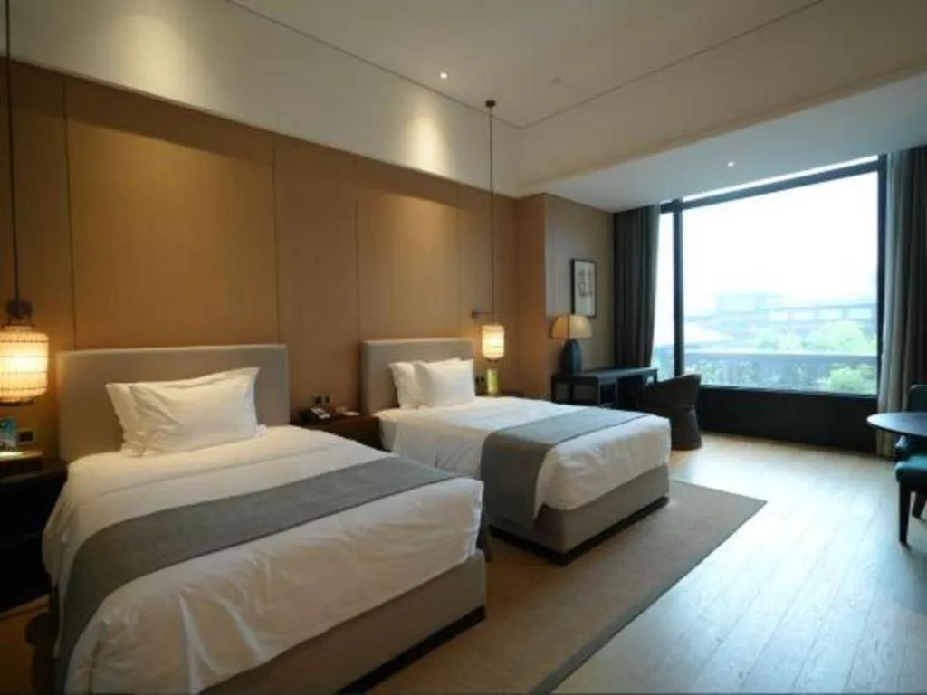 Bed in Jolie Vue Boutique Hotel Sanjiang
