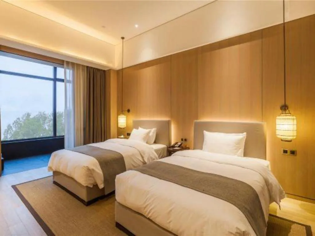 Bed in Jolie Vue Boutique Hotel Sanjiang