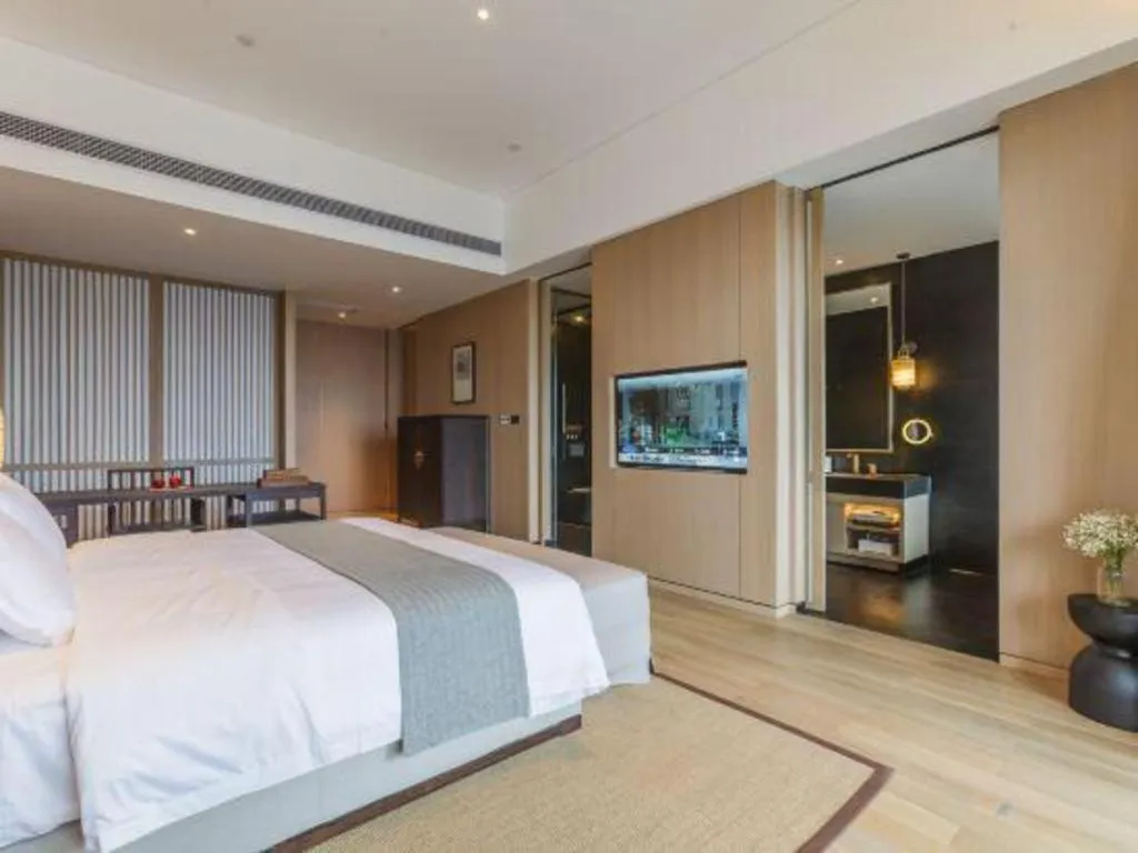 Bed in Jolie Vue Boutique Hotel Sanjiang