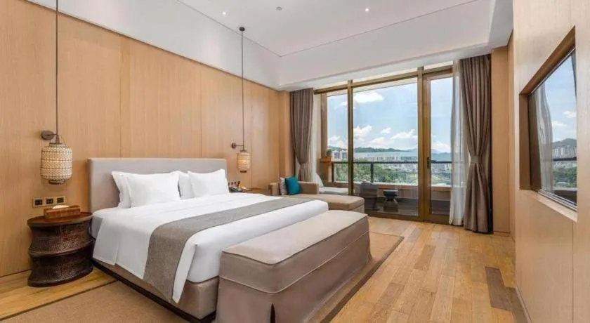Bed in Jolie Vue Boutique Hotel Sanjiang