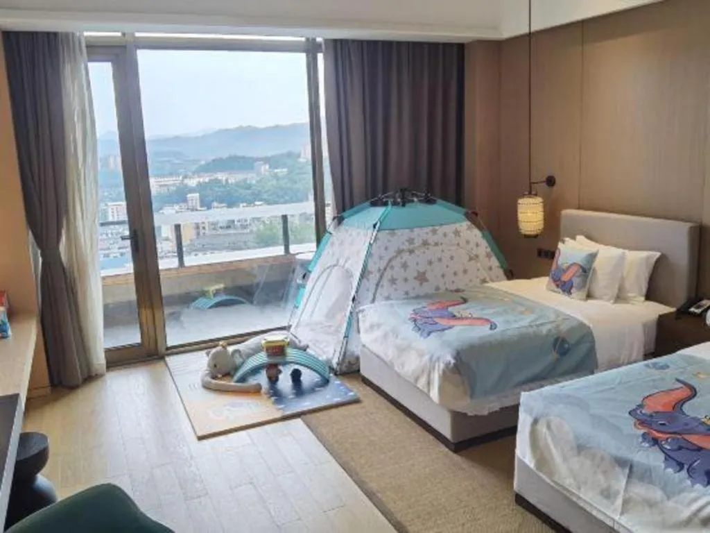 Bed in Jolie Vue Boutique Hotel Sanjiang