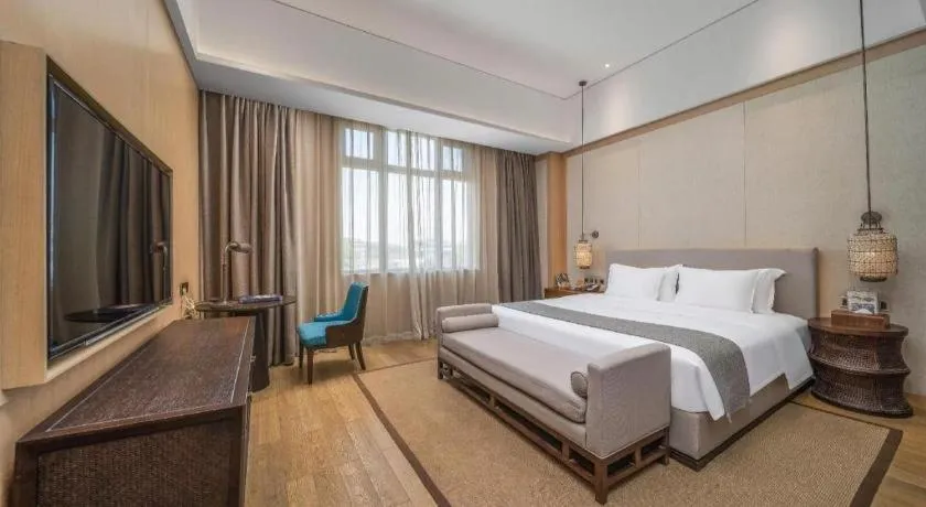 Bed in Jolie Vue Boutique Hotel Sanjiang