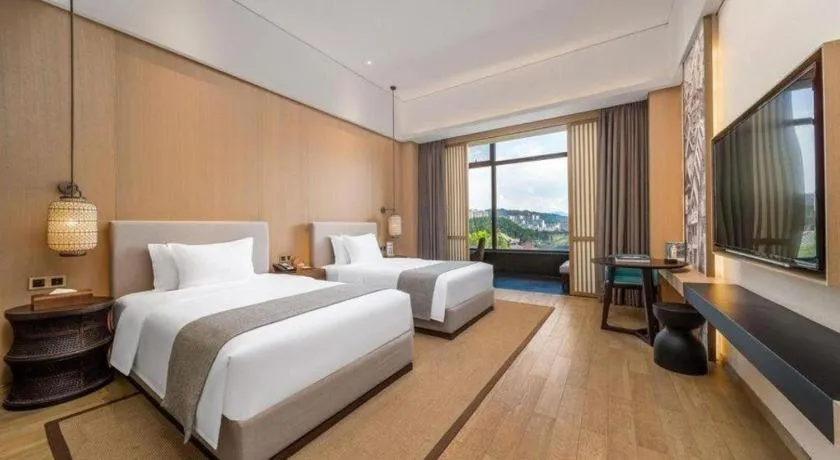 Bed in Jolie Vue Boutique Hotel Sanjiang