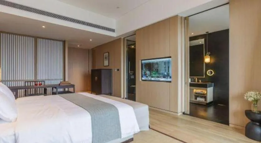 Bed in Jolie Vue Boutique Hotel Sanjiang