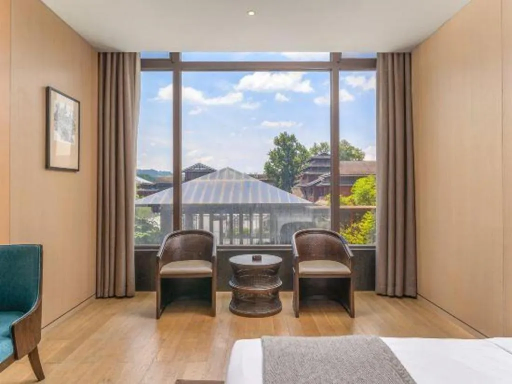 Bed in Jolie Vue Boutique Hotel Sanjiang