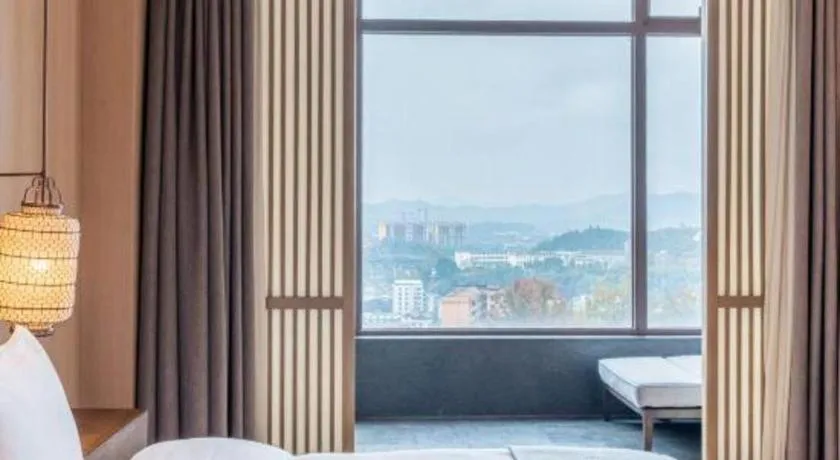 Bed in Jolie Vue Boutique Hotel Sanjiang