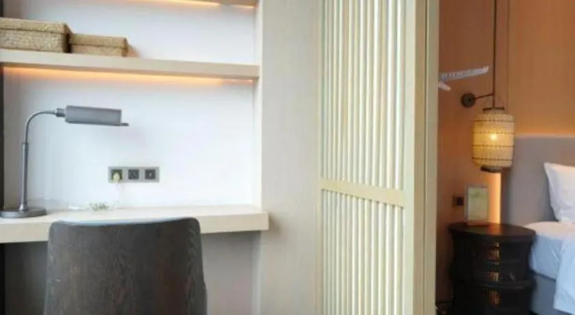 Bed in Jolie Vue Boutique Hotel Sanjiang