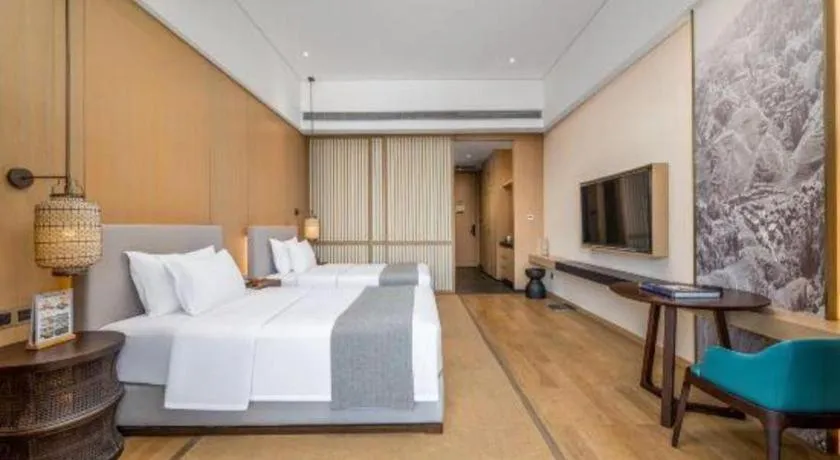 Bed in Jolie Vue Boutique Hotel Sanjiang
