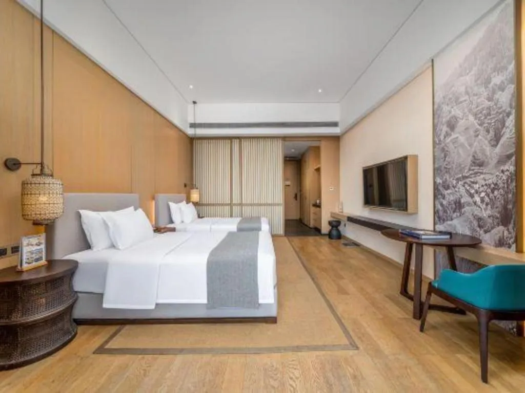 Bed in Jolie Vue Boutique Hotel Sanjiang