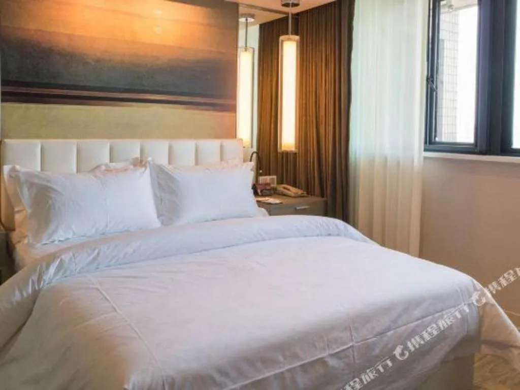 Bed in Jinjiang Metropolo Hotel - Hangzhou Xiasha