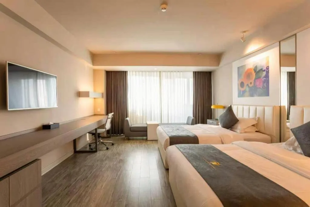 Bed in Jinjiang Metropolo Hotel - Hangzhou Xiasha