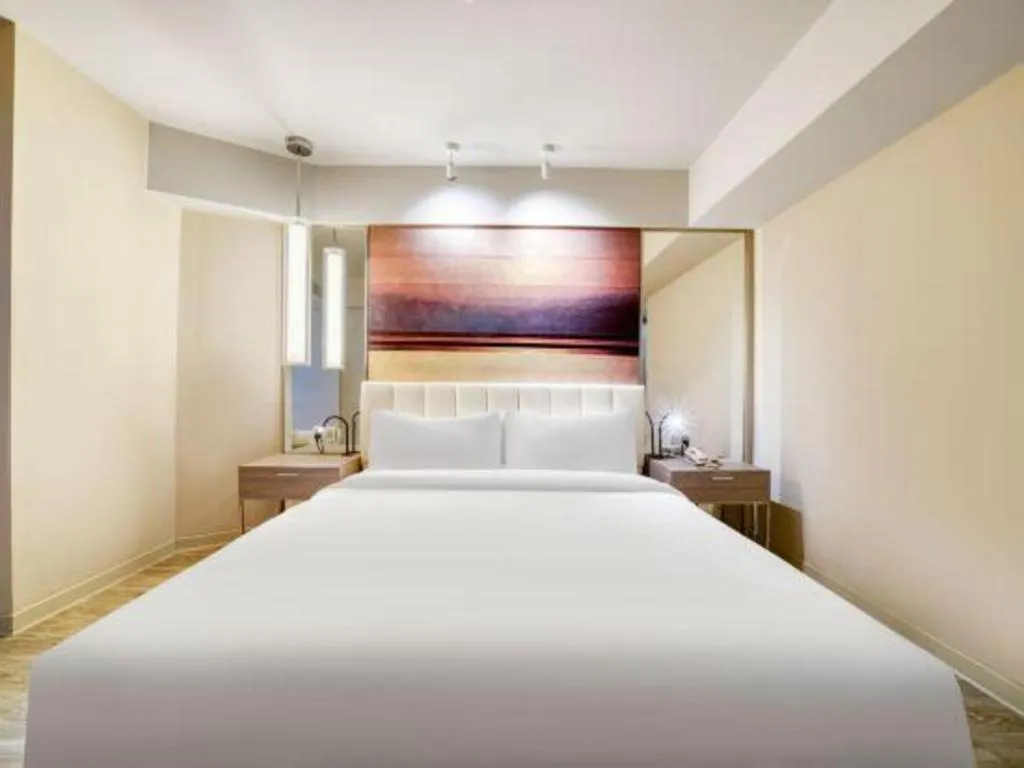 Bed in Jinjiang Metropolo Hotel - Hangzhou Xiasha