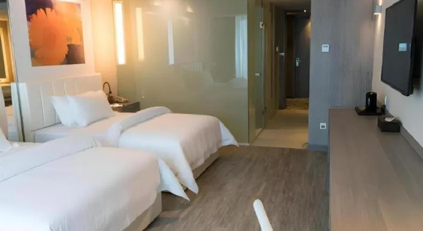 Bed in Jinjiang Metropolo Hotel - Hangzhou Xiasha