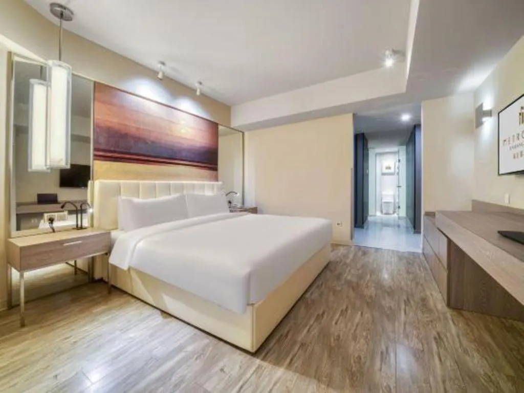 Bed in Jinjiang Metropolo Hotel - Hangzhou Xiasha