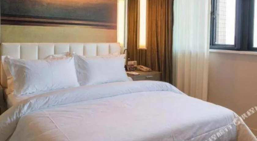 Bed in Jinjiang Metropolo Hotel - Hangzhou Xiasha