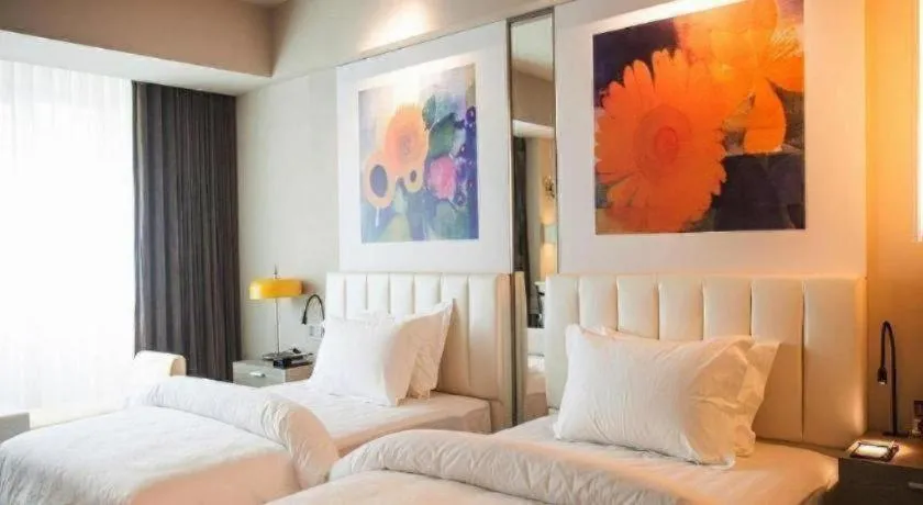 Bed in Jinjiang Metropolo Hotel - Hangzhou Xiasha