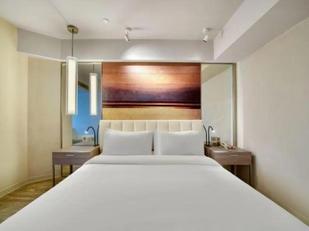 Bed in Jinjiang Metropolo Hotel - Hangzhou Xiasha