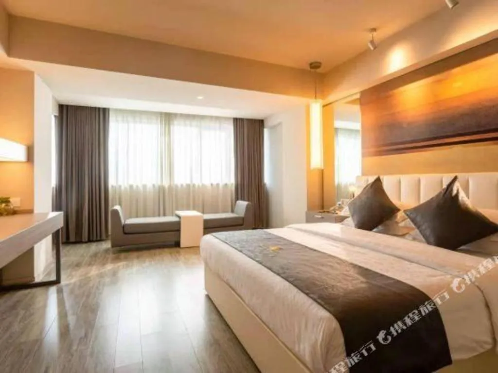 Bed in Jinjiang Metropolo Hotel - Hangzhou Xiasha