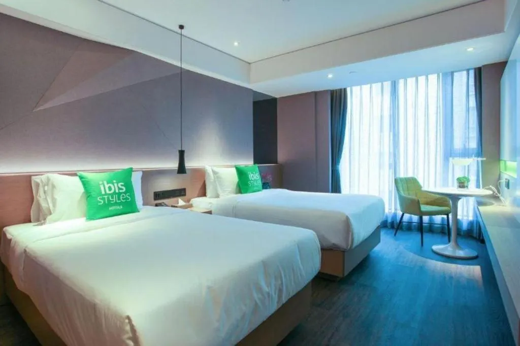 Bed in ibis Styles Yangzhou Baixiang Rd Hotel