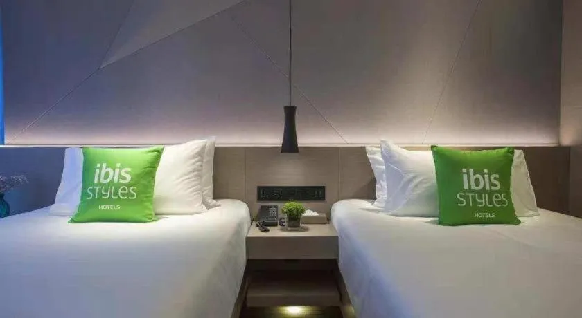 Bed in ibis Styles Yangzhou Baixiang Rd Hotel