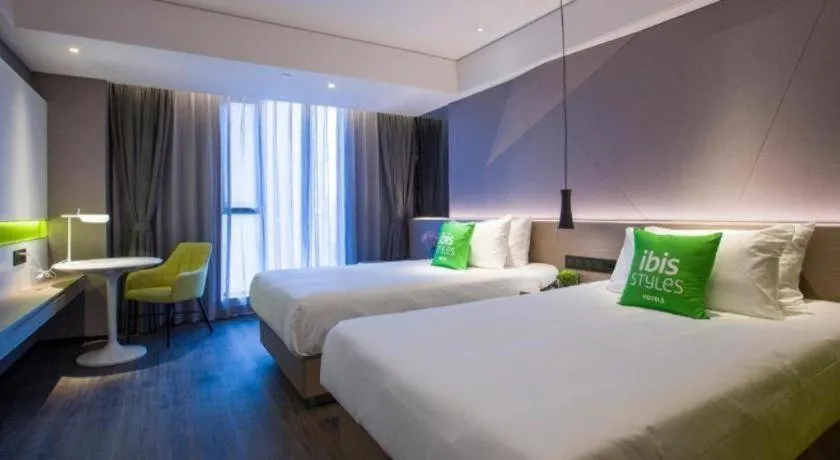 Bed in ibis Styles Yangzhou Baixiang Rd Hotel