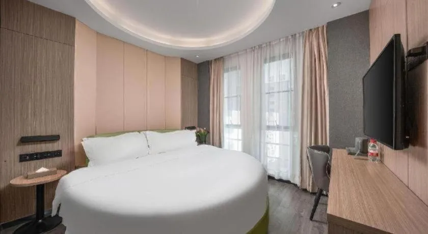 Bed in ibis Styles Dongguan Chang-an Wanda Plaza Hotel