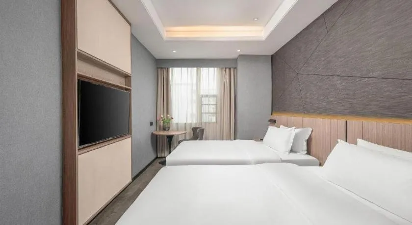 Bed in ibis Styles Dongguan Chang-an Wanda Plaza Hotel