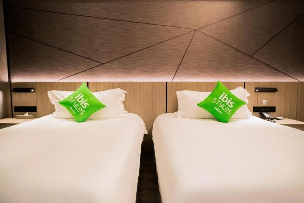 Bed in ibis Styles Dongguan Chang-an Wanda Plaza Hotel