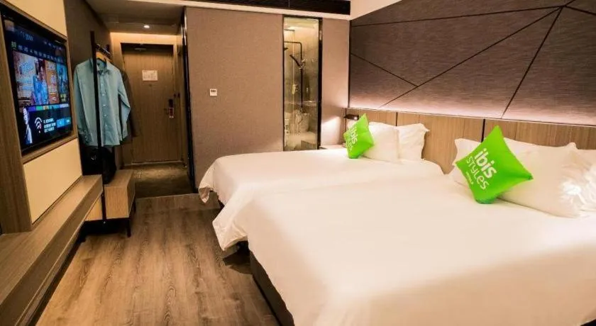 Bed in ibis Styles Dongguan Chang-an Wanda Plaza Hotel