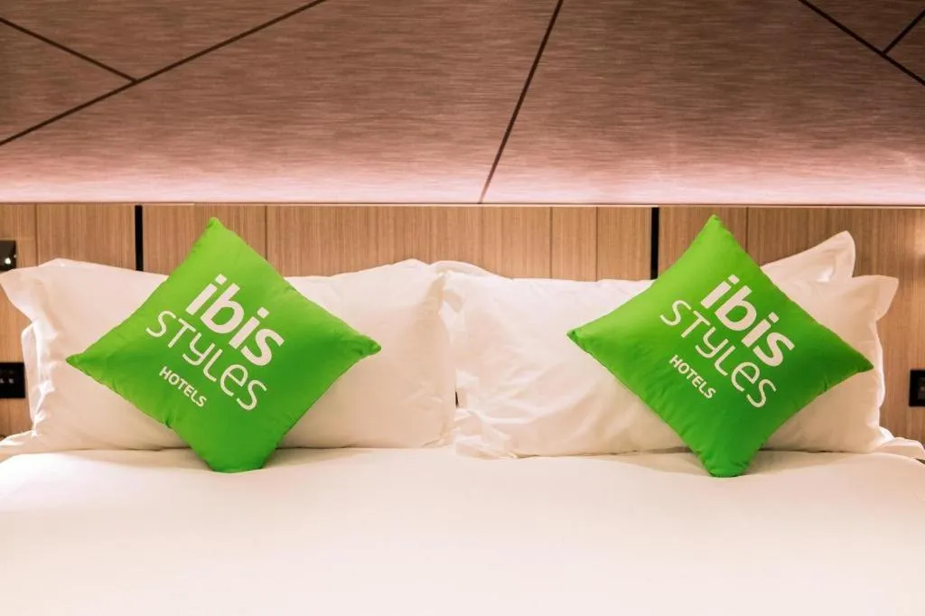Bed in ibis Styles Dongguan Chang-an Wanda Plaza Hotel