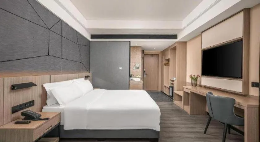 Bed in ibis Styles Dongguan Chang-an Wanda Plaza Hotel
