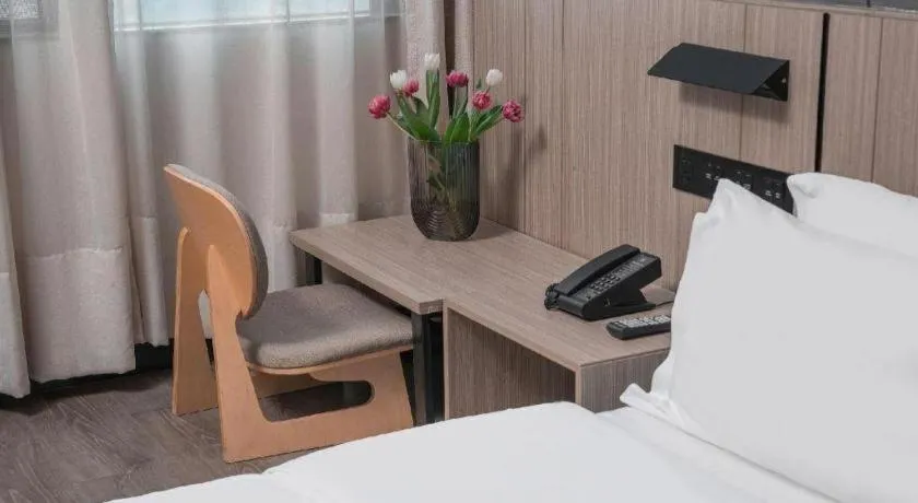 Bed in ibis Styles Dongguan Chang-an Wanda Plaza Hotel