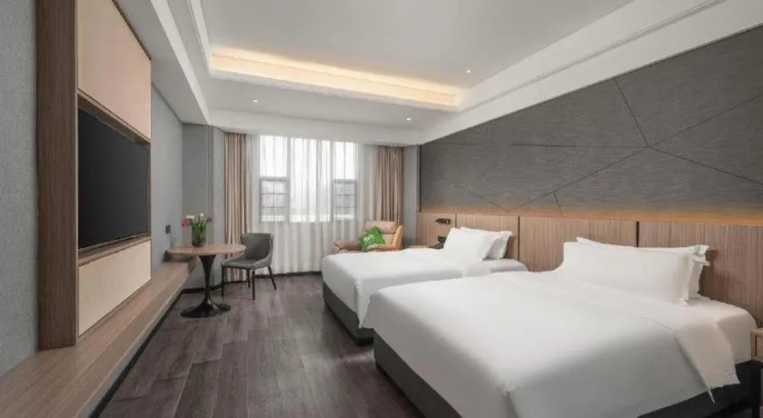 Bed in ibis Styles Dongguan Chang-an Wanda Plaza Hotel