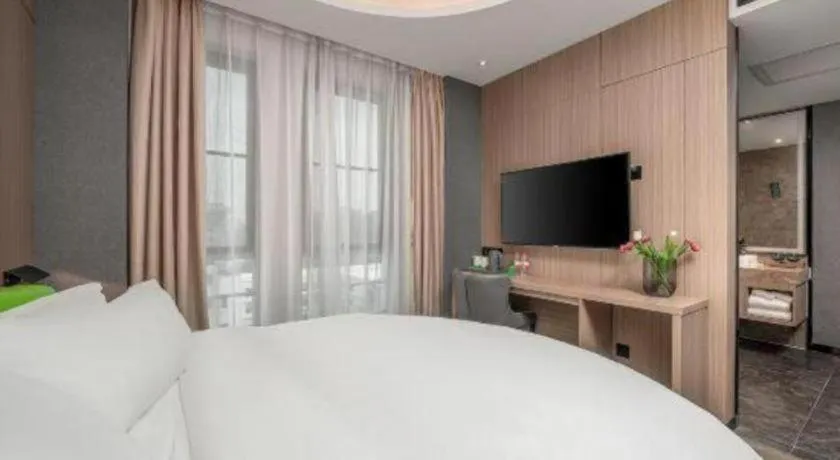 Bed in ibis Styles Dongguan Chang-an Wanda Plaza Hotel