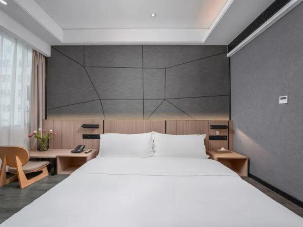 Bed in ibis Styles Dongguan Chang-an Wanda Plaza Hotel