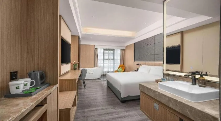 Bed in ibis Styles Dongguan Chang-an Wanda Plaza Hotel