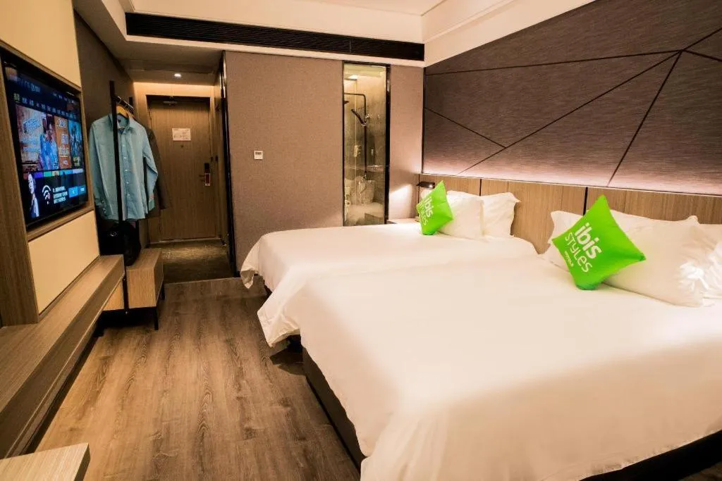Bed in ibis Styles Dongguan Chang-an Wanda Plaza Hotel