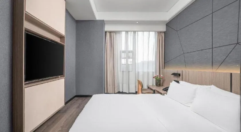 Bed in ibis Styles Dongguan Chang-an Wanda Plaza Hotel