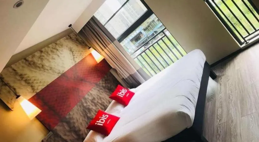 Bed in ibis Chengdu East Railway Station Hotel