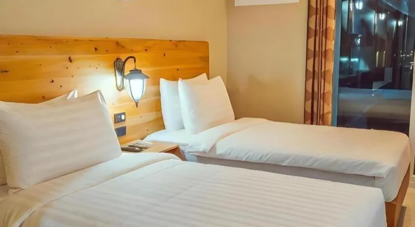 Bed in Roman Empire Panglao Boutique Resort