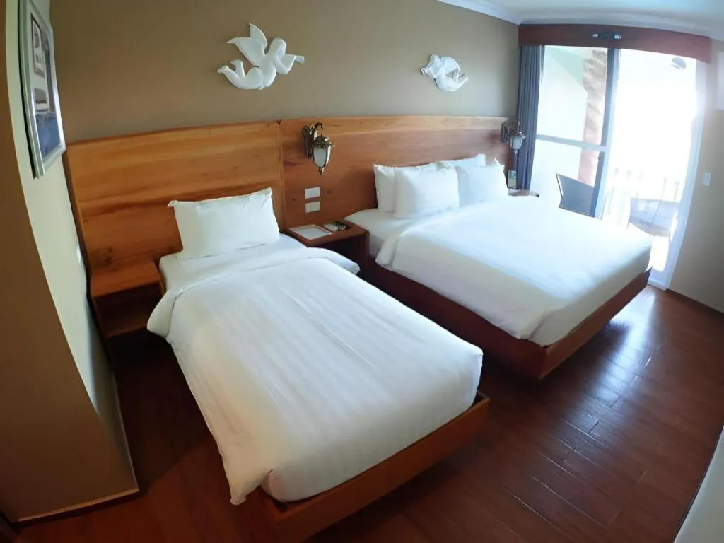 Bed in Roman Empire Panglao Boutique Resort