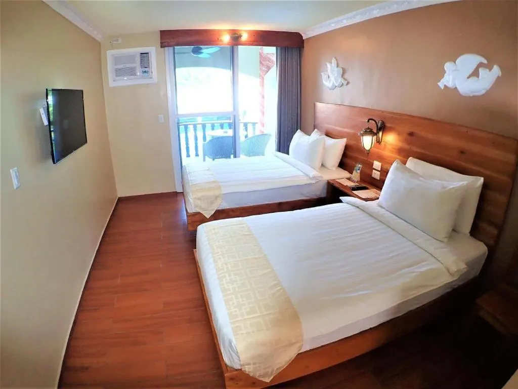 Bed in Roman Empire Panglao Boutique Resort