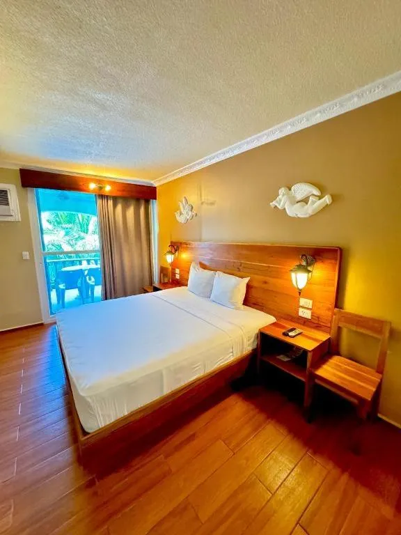Bed in Roman Empire Panglao Boutique Resort