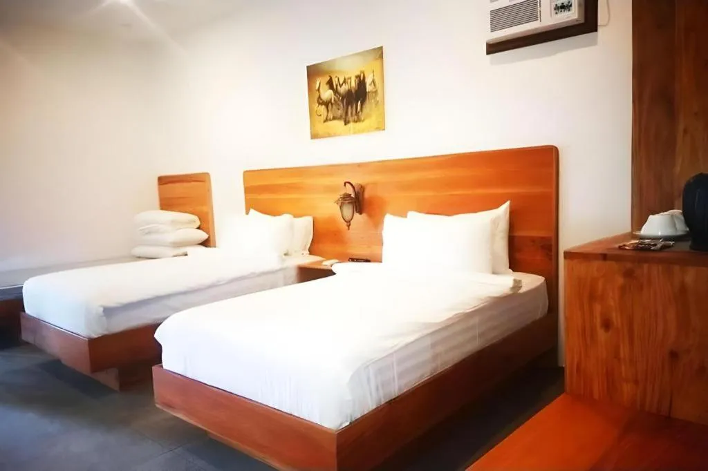 Bed in Roman Empire Panglao Boutique Resort