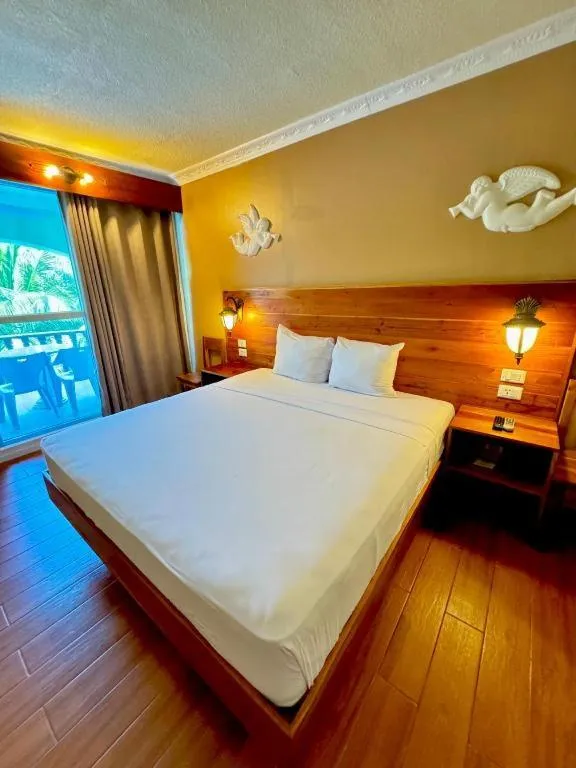 Bed in Roman Empire Panglao Boutique Resort